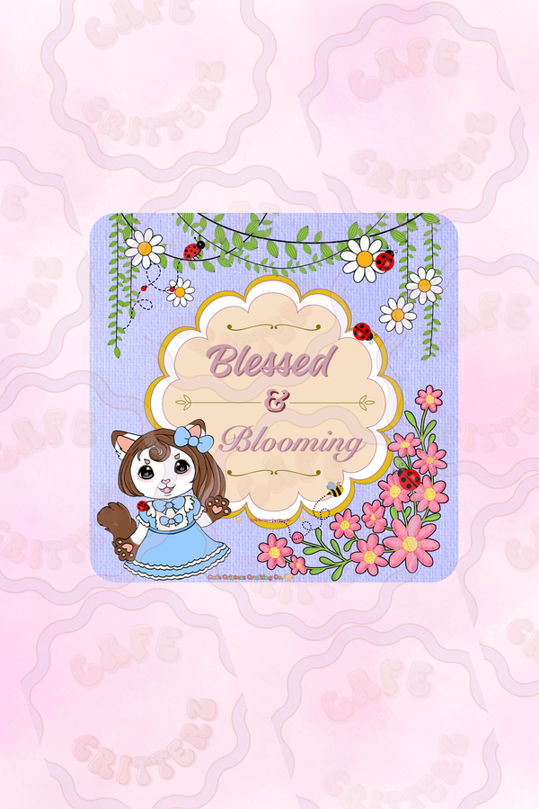 Cream zippered tote bag with the words “Blessed & Blooming” printed in the center. The design includes blooming white daisies, green curling ivy vines, tiny red ladybugs, and a soft Cafe Critterz garden-inspired style.