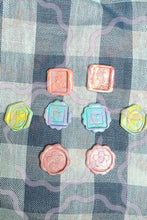 Load image into Gallery viewer, Set of handmade pastel wax seals with marbled spring colors and raised floral stamp designs. The quarter-sized Cafe Critterz wax seal embellishments have a soft vintage-inspired look for junk journals, scrapbooking, happy mail, gift wrapping, and creative paper crafts.
