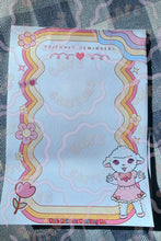 Load image into Gallery viewer, Cafe Critterz style 5" x 7" Sleepy Sweet memo pad featuring a cute cartoon lamb character illustrated in a whimsical lolita inspired design. This retro floral notepad includes decorative rainbow borders and spring picnic blanket details for a playful, cozy aesthetic. Perfect for writing to do lists, reminders, journaling notes, and daily planning, this memo notepad also makes a charming addition to junk journals, scrapbooks, planners, and other creative craft projects.

